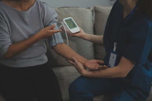 Doctor doing professional pressure examine her young patient photo