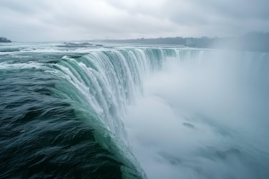 A majestic waterfall, with thundering cascades and misty spray photo