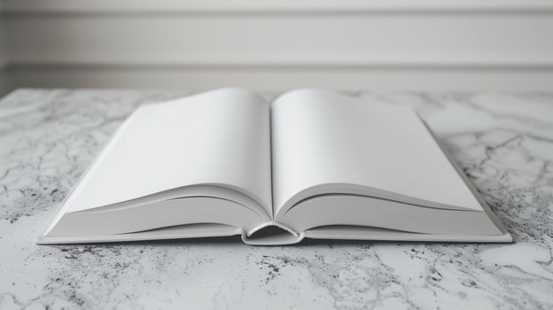 White hardcover book open on a clean table, focus on reading and learning, isolated photo