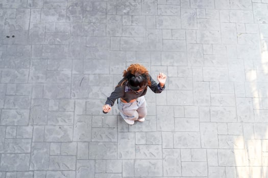 Asian women do freestyle hip hop and breakdancing in a public space in the middle of the city. With a cheerful and happy attitude photo
