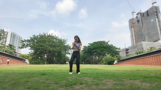 Asian women do freestyle hip hop and breakdancing in a public space in the middle of the city. With a cheerful and happy attitude photo