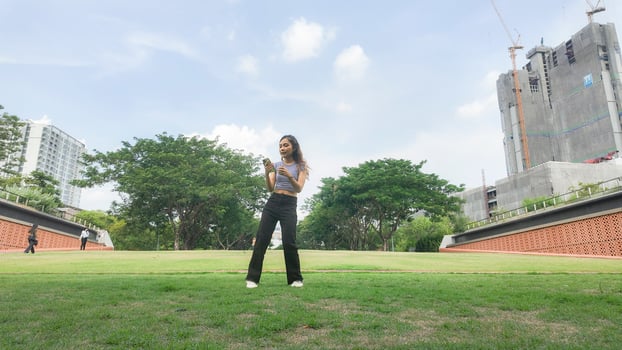 Asian women do freestyle hip hop and breakdancing in a public space in the middle of the city. With a cheerful and happy attitude photo
