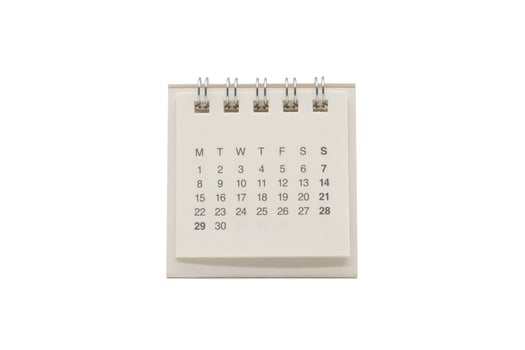 Paper mini desk calendar isolated on white background. Calendar has no months and no years. photo