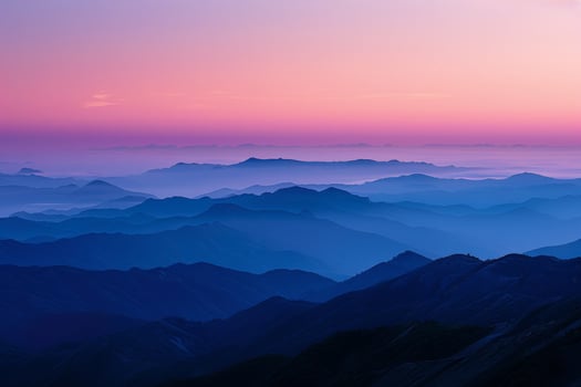 Vibrant Sunset Over Mountain Ranges photo