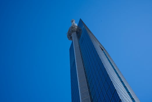 View of the Fukuoka Tower a tall skyscraper building located in the Momochihama area of Fukuoka photo