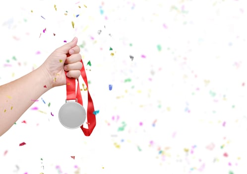 holding a silver coin Celebrate success photo