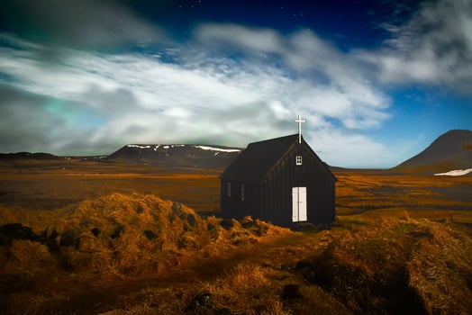 Iceland - march 13, 2023 - Krysuvikurkirkja, a historic church. Northern lights in Krysuvikurkirkja in Reykjanes peninsula, Iceland photo