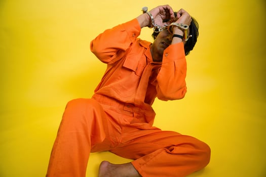 Afraid person in prison photo