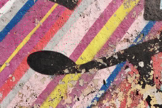 Weathered Graffiti Wall. Urban Street Art Beauty. Texture Backgr photo