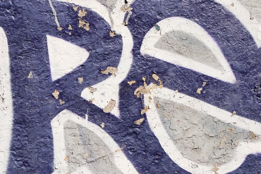 Weathered Graffiti Wall. Urban Street Art Beauty. Texture Backgr photo