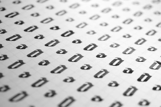 Calligraphy black and white letters O background. Lettering practice writing worksheet. Handwriting symbol filling pattern. Calligraphic letter o learning skills paper page. photo