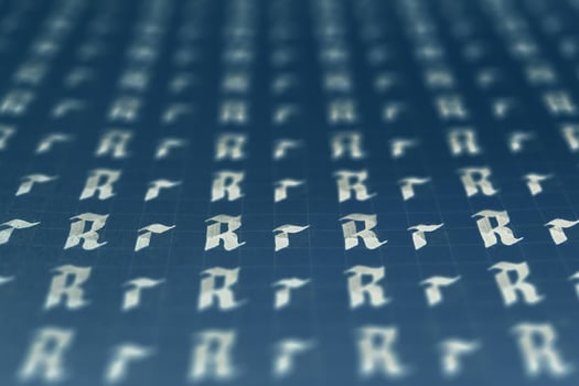 Calligraphic white on dark blue letter R learning skills paper page. Calligraphy letters r background. Lettering practice writing worksheet. Handwriting symbol filling pattern. photo