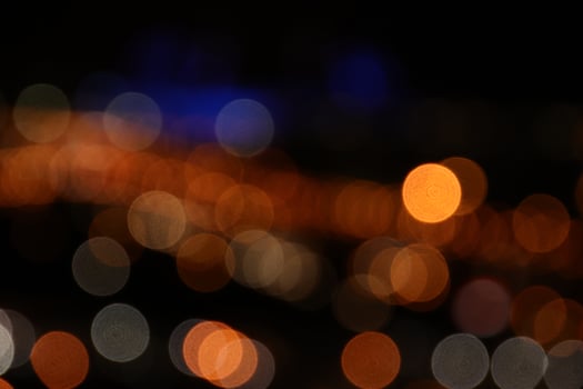 Road light blur. Blurred lights background. photo