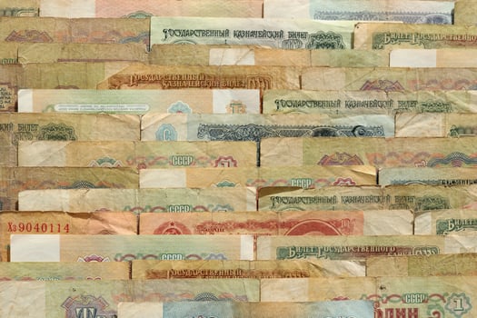 Old Russian wealth financial backdrop. Rubles earning pattern. Soviet money banknotes texture. Cash filling background. photo