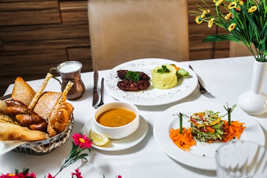 White Table Set With a Variety of Delicious Food photo