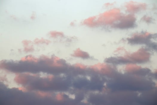 Breeze belt of cumulus pink cloudy heaven skies beautiful panorama. photo