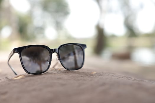 Sunglasses on the beach in summer photo