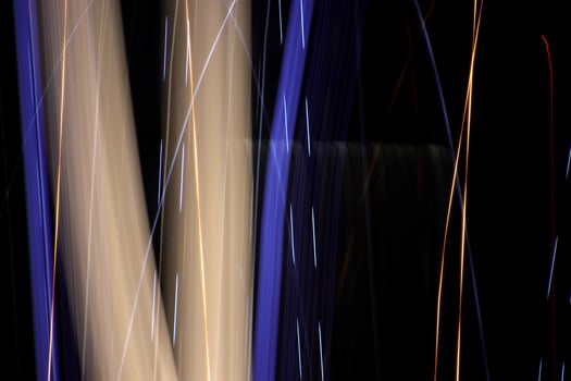 Night exposure zoom traces background. Light lines leaks exposition backdrop. Night city rays glow texture. photo