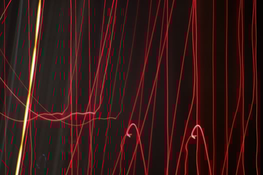 Night exposure zoom traces background. Light lines leaks exposition backdrop. Night city rays glow texture. photo
