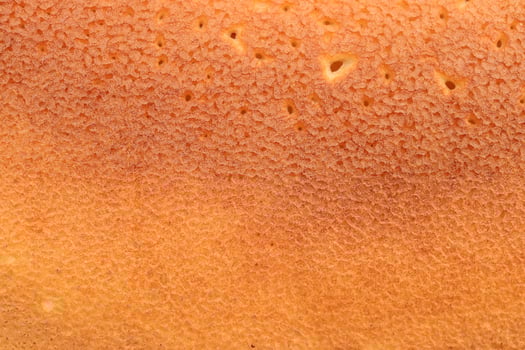 Clean Backed traditional desert pancake pattern texture. Macro closeup. photo