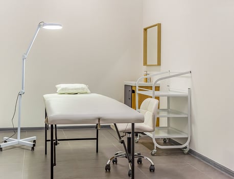 White interior of a modern cosmetology room in a beauty salon photo