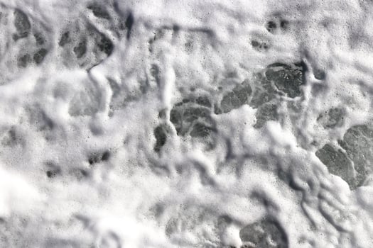 Sea wave foam texture. Marine aqua motion surface background. Outdoor water froth swirls backdrop. photo