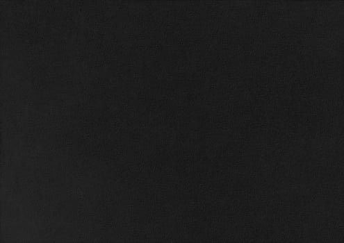 Black paper corrugated texture background. photo