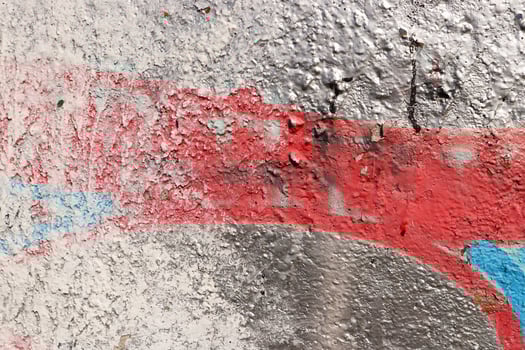 Weathered Graffiti Wall. Urban Street Art Beauty. Texture Backgr photo