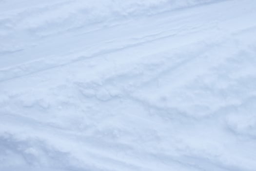 Snow skiing track surface. Ski trail texture. Ski run traces background. photo