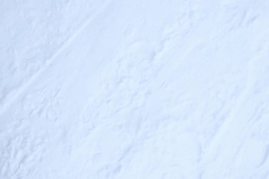 Ski trail texture. Ski run traces background. Snow skiing track surface. photo