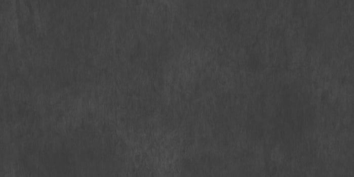 Dark grey chamois clothes pattern. Shammy material backdrop. Shammy-leather textile background. Leather fabric surface. Seamless suede texture. photo