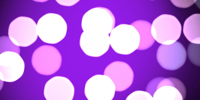 Violet defocused sweet design. Bokeh background. Blurred colored texture. Happy color love creative backdrop. Bright glowing colorful pattern. photo
