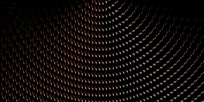 Red lamp flare glow. Fresnel lens pattern. Spotlight glass art texture. Projector lens background creative. Searchlight striped circles screen optical. photo