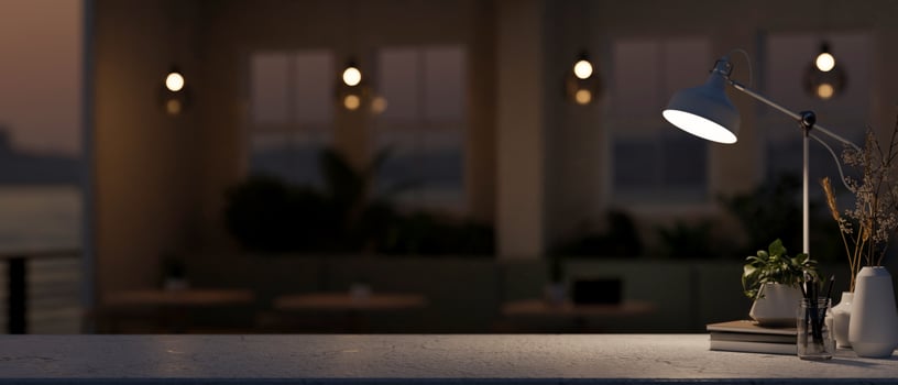 Space for displaying products on a table in a contemporary, dark coffee shop or restaurant at night. photo