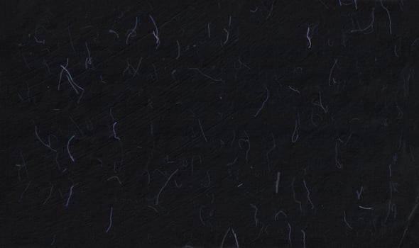Handmade rice black paper texture with blue fibers for scrapbook. photo