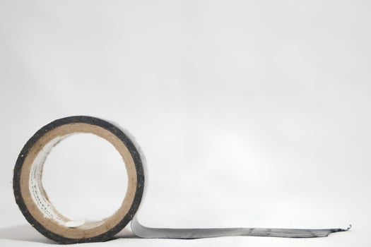 Close-Up of Black Electrical Tape Roll photo