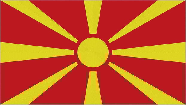 Macedonia embroidery flag. Macedonian emblem stitched fabric. Embroidered coat of arms. Country symbol textile background. photo
