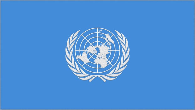 UN - United Nations embroidery flag. Emblem stitched fabric. Embroidered coat of arms. Country symbol textile background. photo