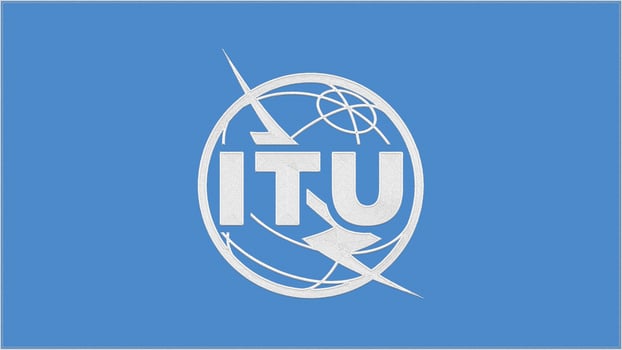 ITU - International Telecommunication Union embroidery flag. Emblem stitched fabric. Embroidered coat of arms. Country symbol textile background. photo