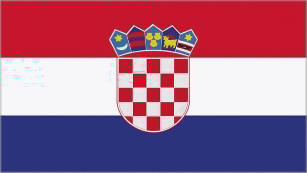 Croatia embroidery flag. Emblem stitched fabric. Embroidered coat of arms. Country symbol textile background. photo