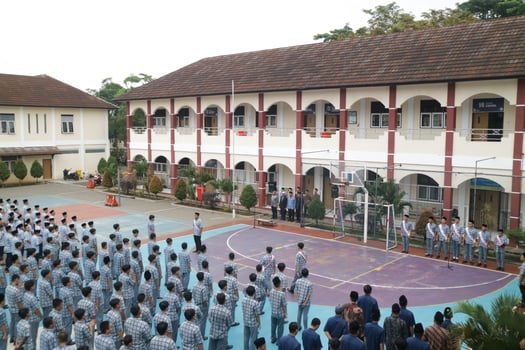 Subang, Indonesia - May 2024, Middle school, high school students and teachers taking part in a ceremony to commemorate National Education Day on the school field photo