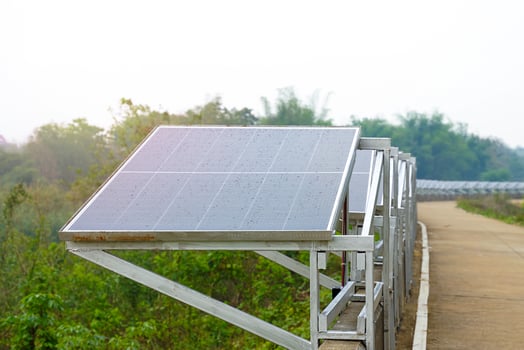 Solar power generation station, they installed several solar panels on a concrete barrier along the river to generate electricity to pump water for agricultural use. photo
