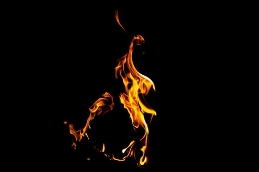 Fire flame texture. Burning material backdrop. Burn effect pattern. Blaze and torch wallpaper. Heat and haze backdrop. photo