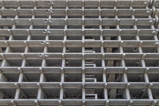 large multi-storey apartment building is under construction photo