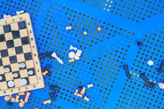 Scattered chess summer day on the blue table in the Park photo