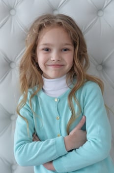 Close up portrait of cute girl smiling photo
