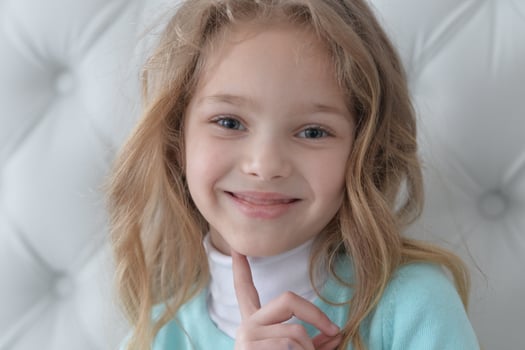 Close up portrait of cute girl smiling photo