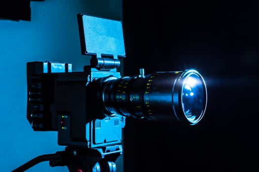 Digital cinema film camera in the dark. camera with copy space for film production, tv or broadcast media banner. photo