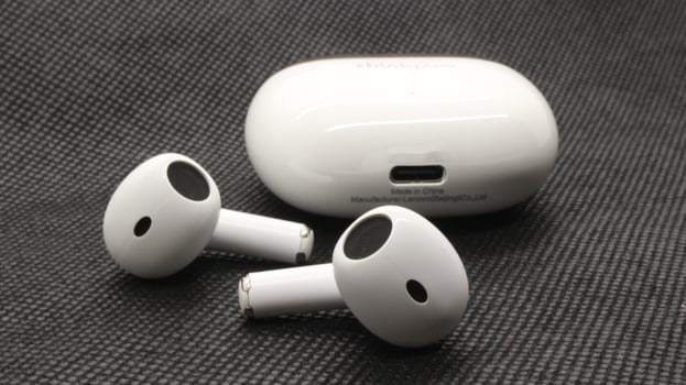 Close up of white TWS true wireless stereo isolated photo