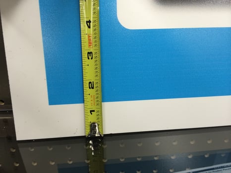 Measuring Tape Being Used on Retail Construction Project photo